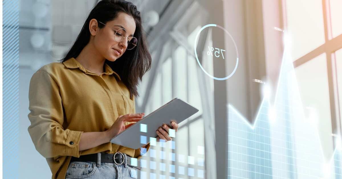 Woman with Tech Data: "Woman using a tablet with a digital growth chart and data overlay.